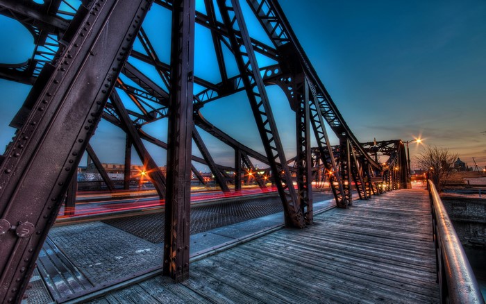 Steel bridge over a river at dusk in Chicago