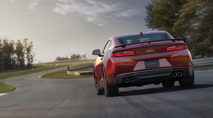 Red 2015 Chevrolet Camaro SS on a Racetrack
