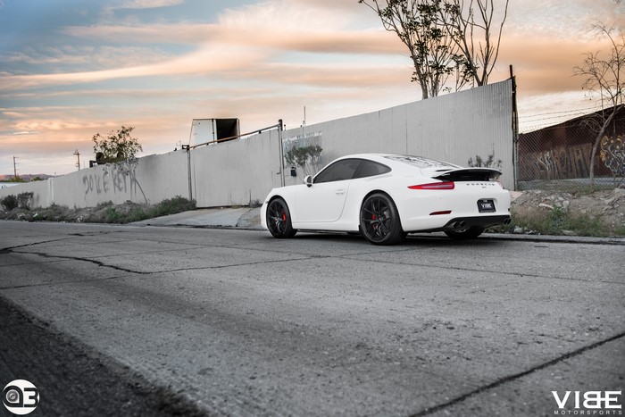 White Porsche 911 on a Road