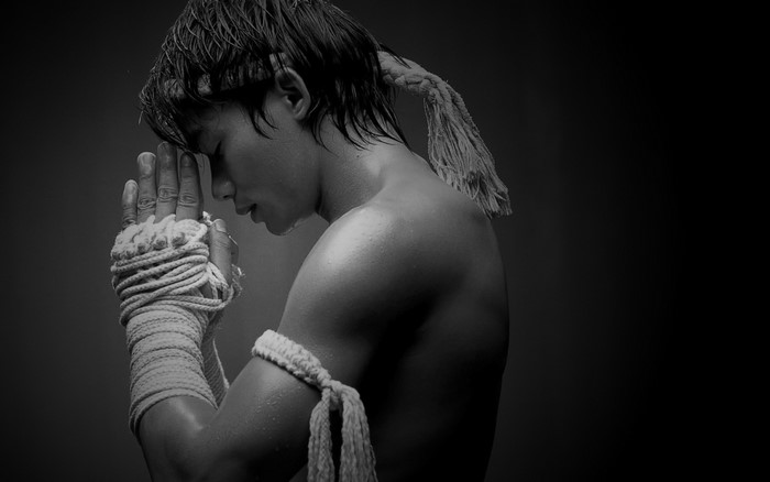 Tony Jaa as Ong-Bak Muay Thai Warrior