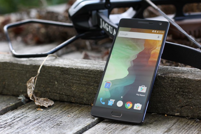 OnePlus 2 smartphone on wooden surface