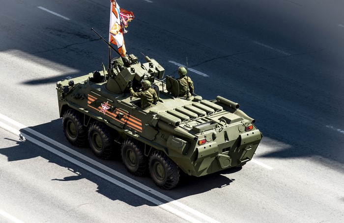 Russian BTR-82A armored personnel carrier with soldiers and flag