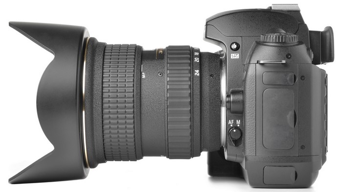 Digital SLR camera with zoom lens and lens hood