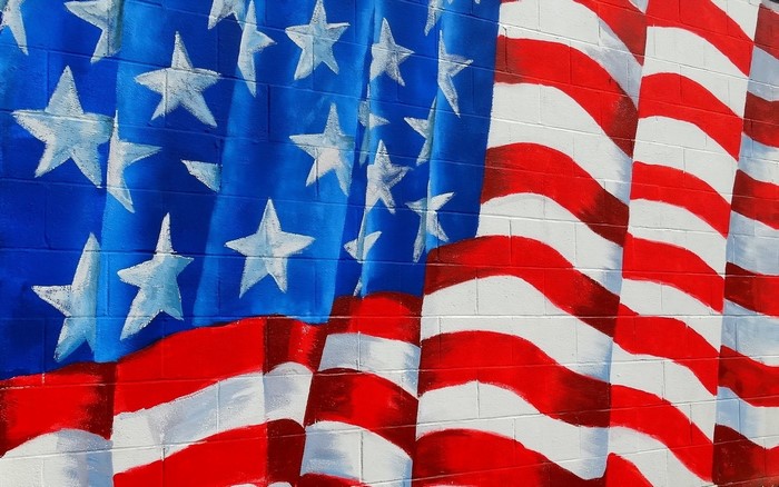 Mural of the American Flag on a Brick Wall