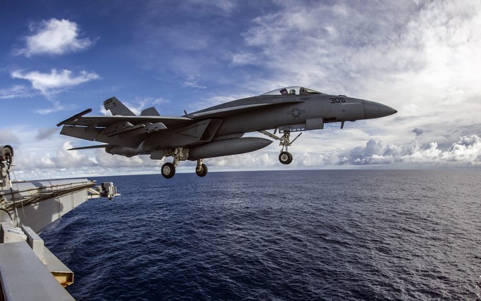 FA-18E Super Hornet landing on aircraft carrier