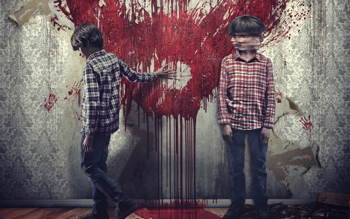 Sinister 2: Two boys and a bloody heart on a wall