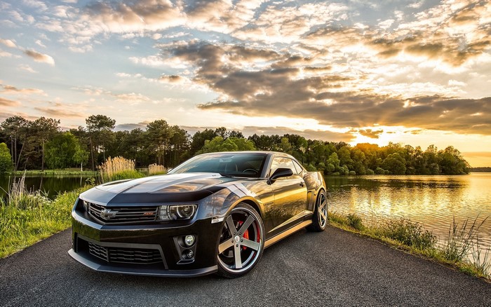 Black Chevrolet Camaro SS by the Lake at Sunset