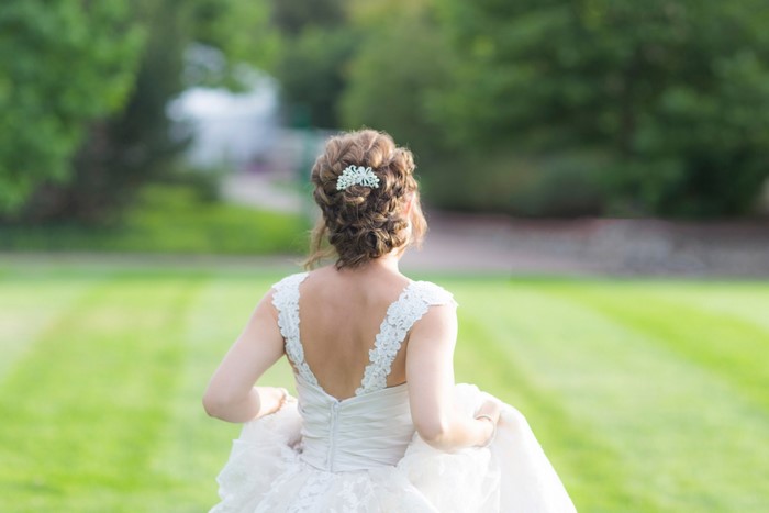 Bride in wedding dress with hair accessory