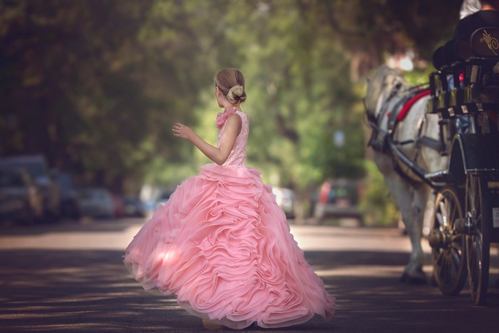 Girl in Pink Dress with Carriage