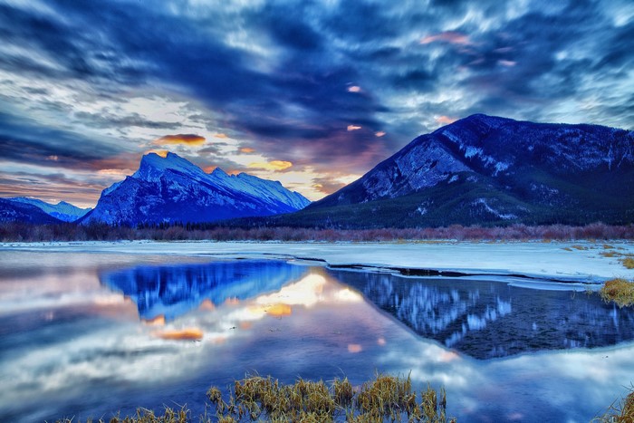 Mountains and lake reflection in Alberta, Canada