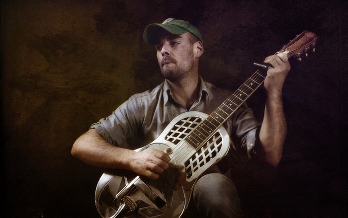 Rambling Rob Young playing a resonator guitar