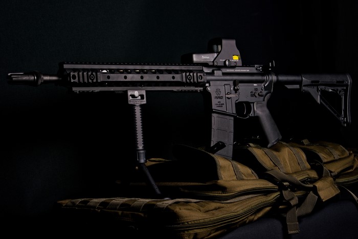 Assault rifle with bipod and optic