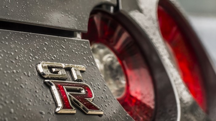 Nissan GT-R Emblem on a Wet Car
