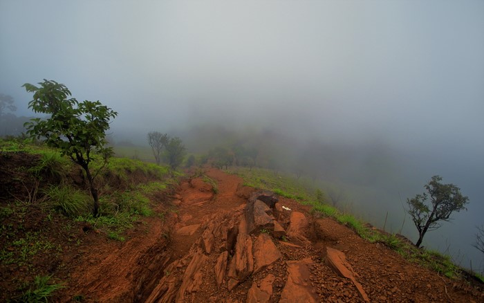Mountain path in fog