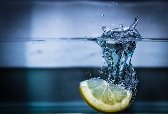 Lemon Slice Dropping into Water