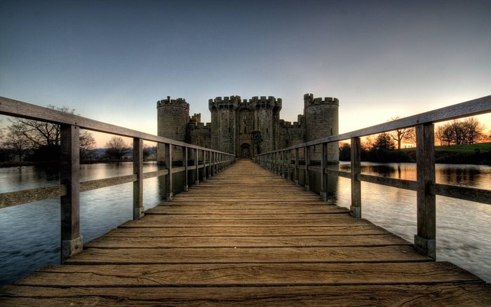 Bodiam Castle and wooden bridge over water