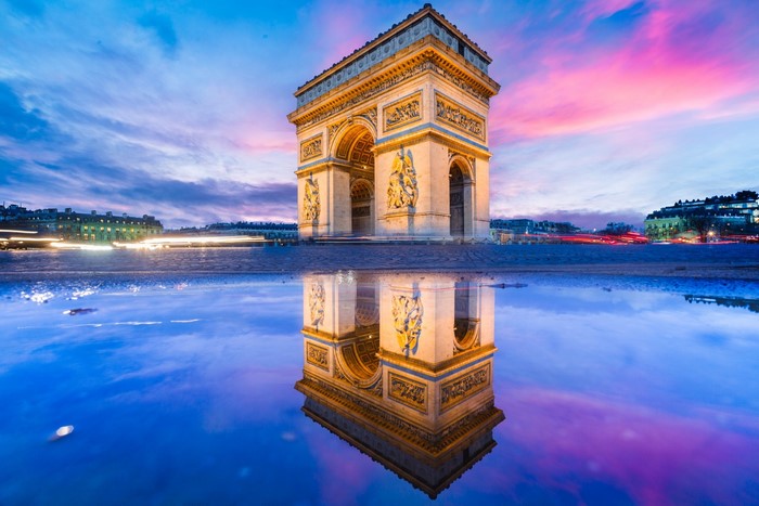 Arc de Triomphe in Paris, France at Dusk