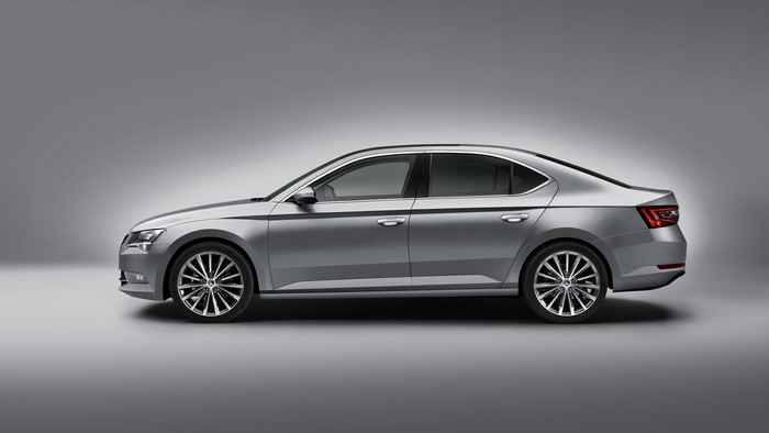 Silver Skoda Superb Sedan from the side