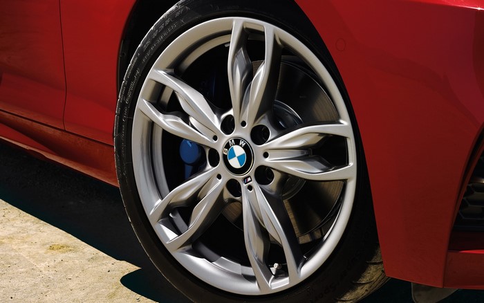 BMW wheel on a red car