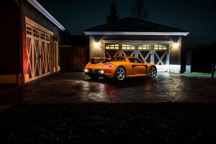 Porsche Carrera GT Arancio Borealis Supercar at Night