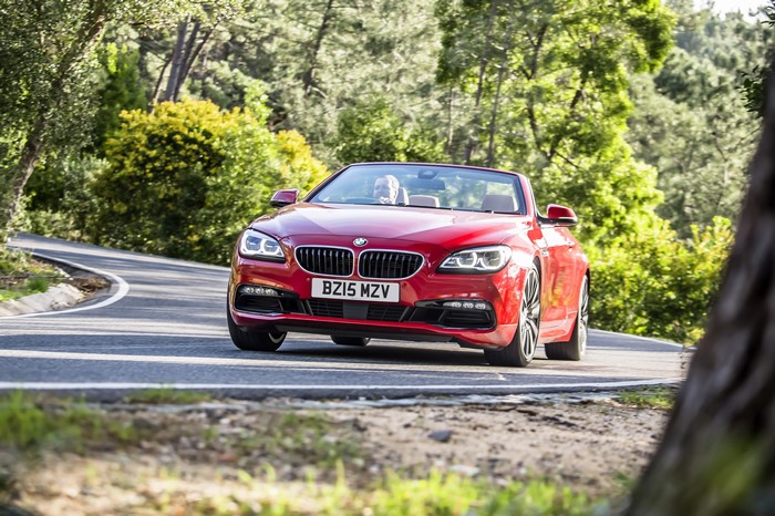 Red 2015 BMW 650i Convertible on a Road