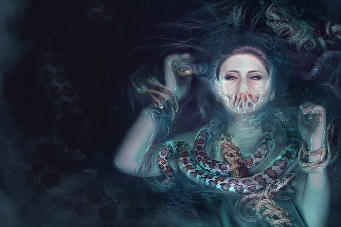 Woman with snakes and ethereal effect