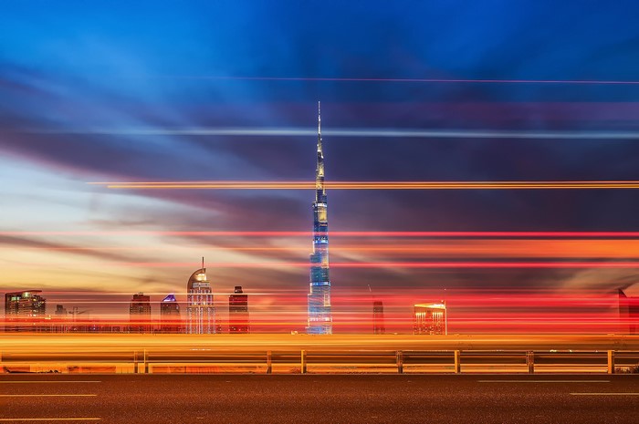 Dubai skyline with light trails at dusk