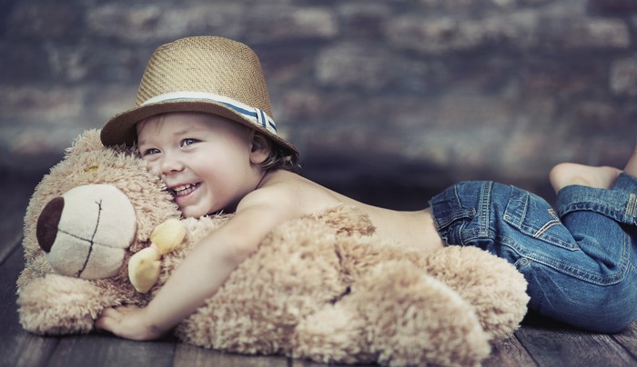 Boy with Teddy Bear and Hat