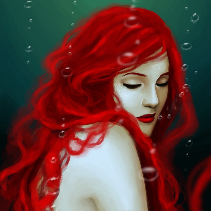 Ariel the Mermaid with flowing red hair