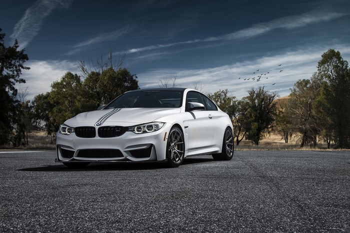 White BMW M4 Coupe on Asphalt Road