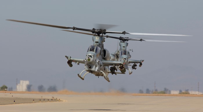 Two AH-1Z Viper helicopters in flight