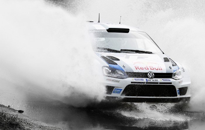 Volkswagen Polo WRC driving through water splash