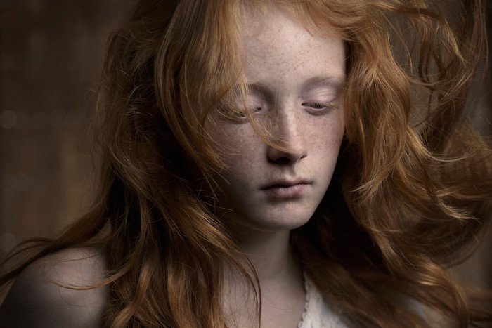 Jamie, a redhead girl with freckles