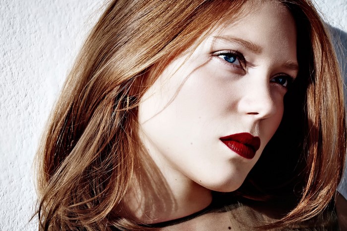 Woman with brown hair and red lipstick