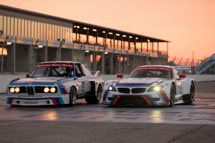 BMW Z4 GTLM and 3.0 CSL race cars at sunset