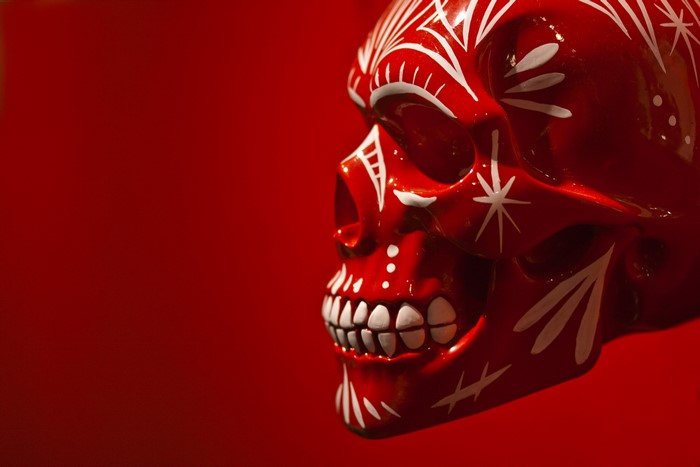 Red skull with white decorations