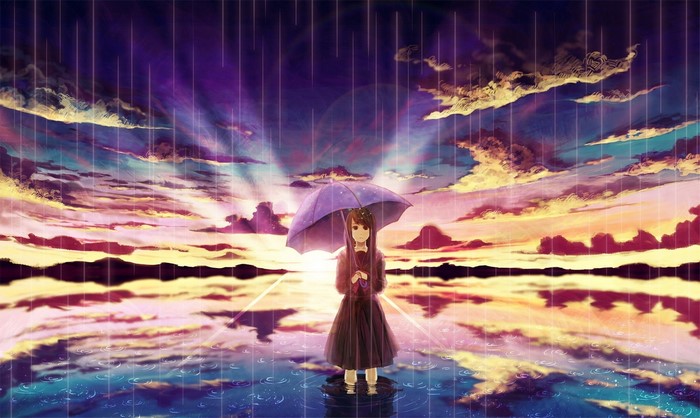 Girl with umbrella in the rain at sunset