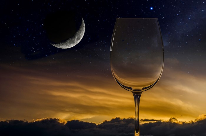 Wine glass with moon and stars