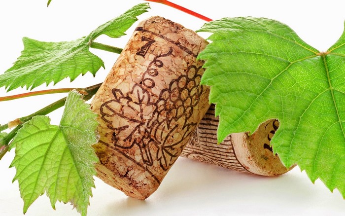 Wine corks with grape vine leaves