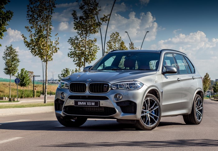 Silver BMW X5 M F15 parked on a road