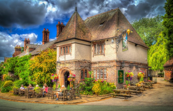 Pub with outdoor seating in Little Budworth, England
