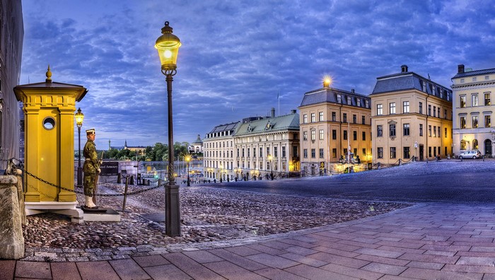 Soldier guarding yellow booth in Stockholm, Sweden