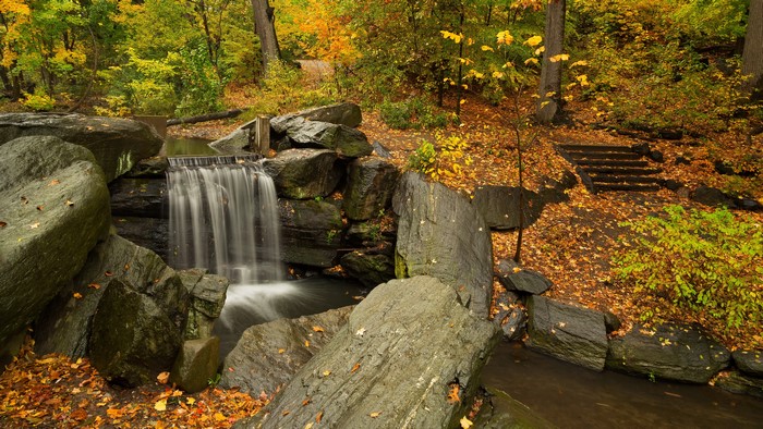 Autumn Waterfall with Stones and Stairs
