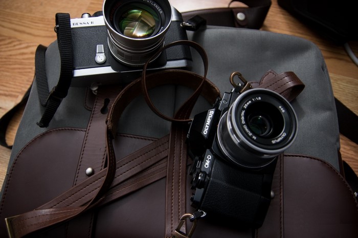 Two cameras on a bag