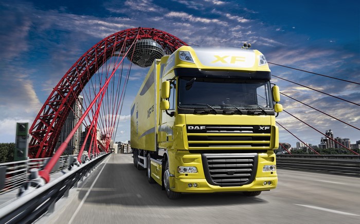 Yellow DAF XF105 Truck on a Bridge