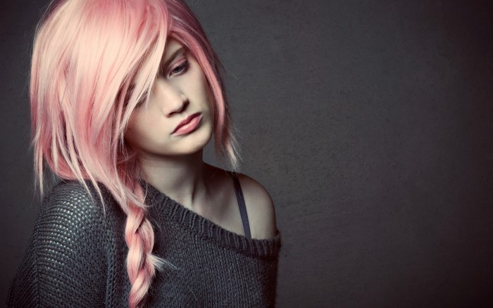 Woman with pink hair and braid