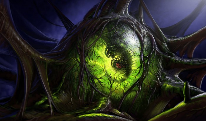 A monstrous creature coiled within a glowing green orb