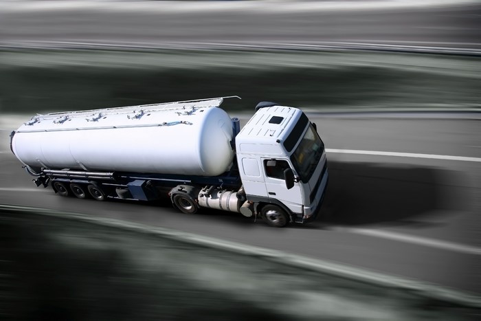 White Tanker Truck in Motion