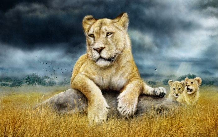 Lioness and cubs in a savanna landscape