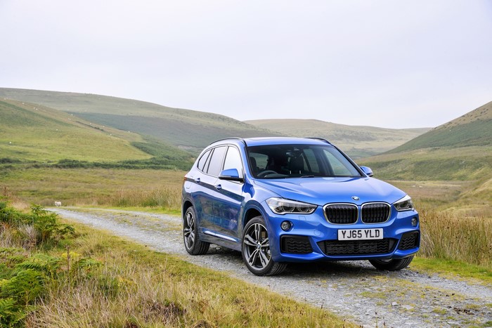 Blue BMW X1 xDrive M Sport on a dirt road